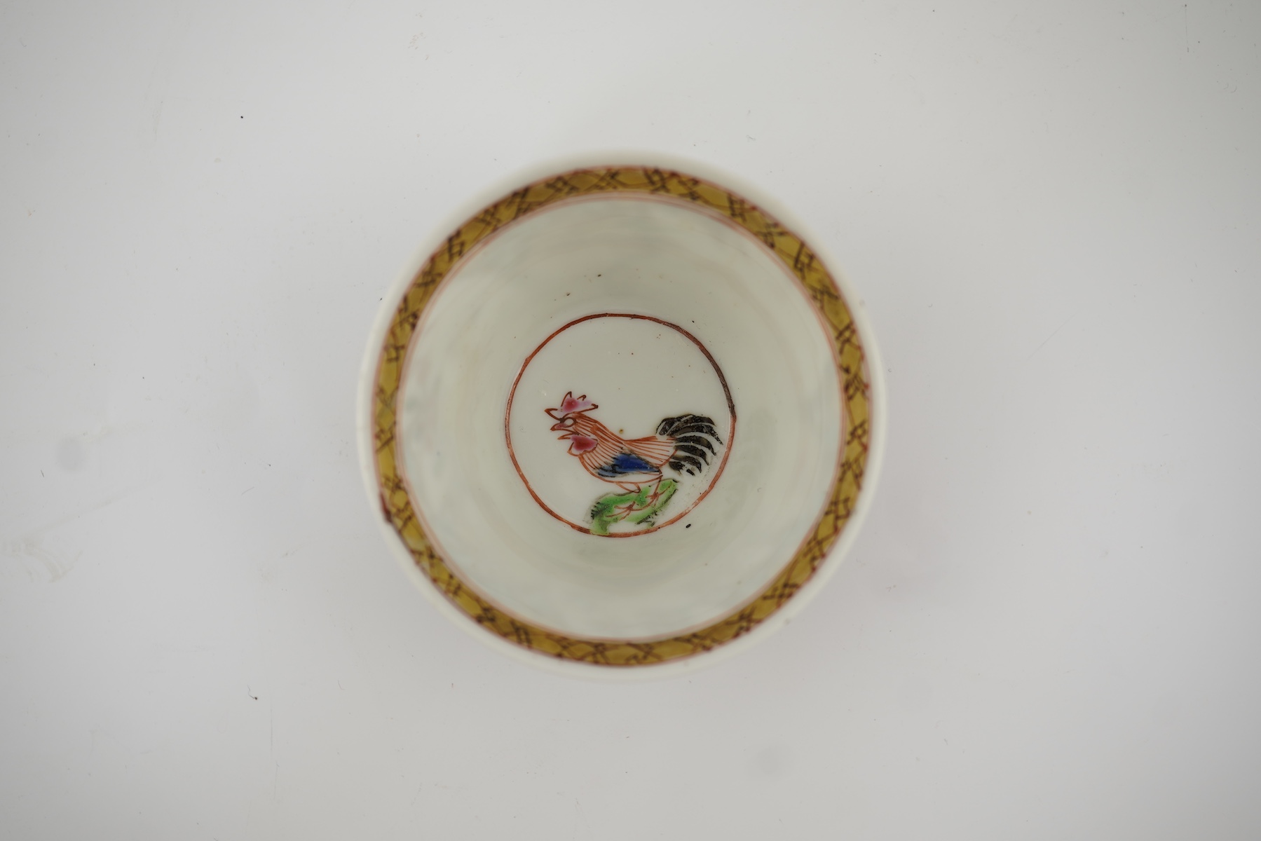 A Chinese semi-eggshell porcelain saucer and a similar tea bowl, Yongzheng period